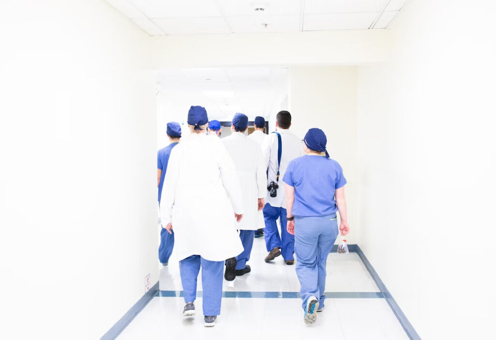 medical professionals going inside the hospital