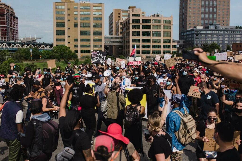 photo of people protesting on the streets