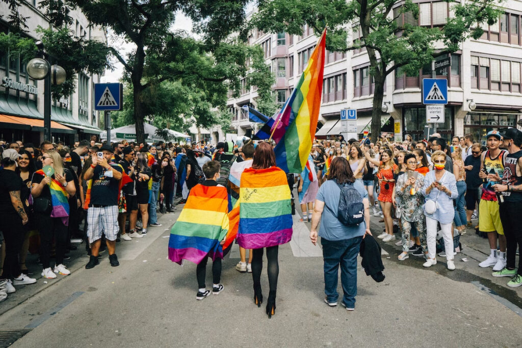 people celebrating equality through a parade