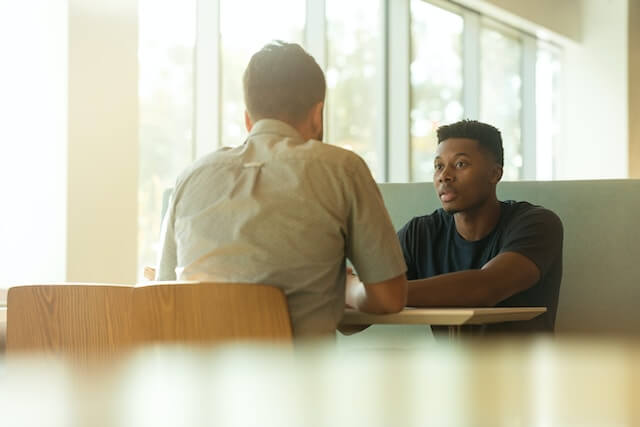 two people having a discussion