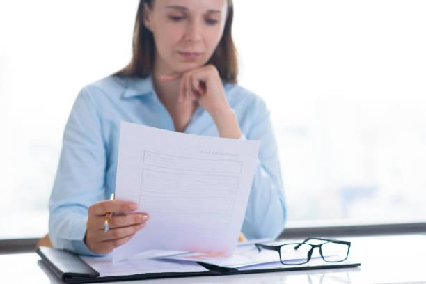 a person studying a document