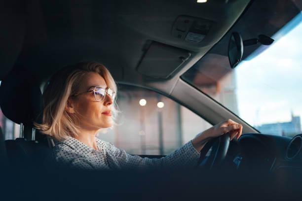 a woman driving a car