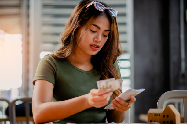 photo of a woman counting her money