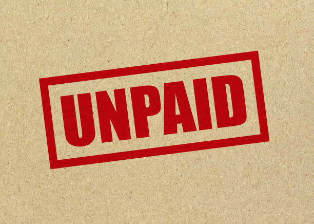 unpaid stamp on a brown background